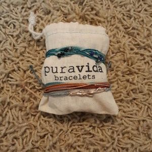 Three Pura Vida bracelets